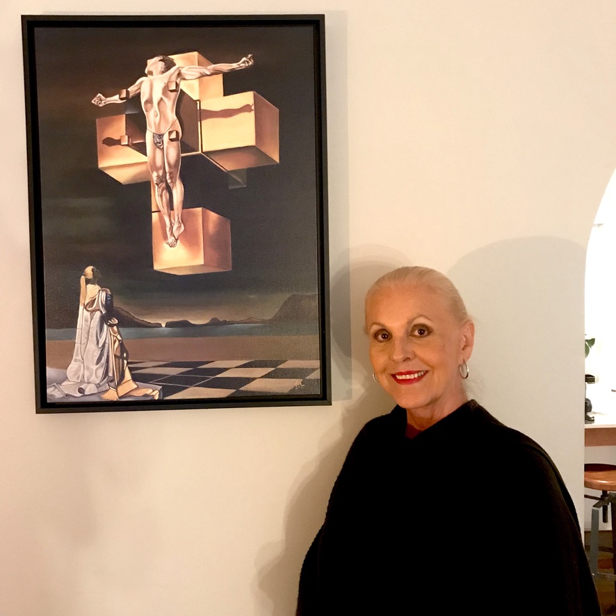 Johanna Suarez beside her painting after Salvador Dalí